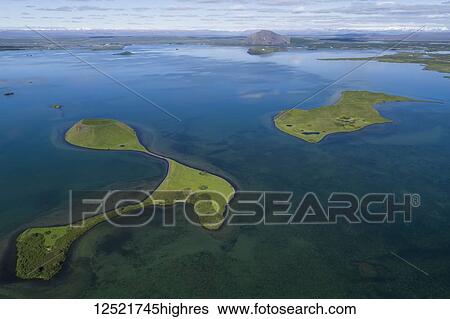 Stock Photograph - Extinct volcanoes in Lake Myvatn, Northern Iceland; Iceland. Fotosearch