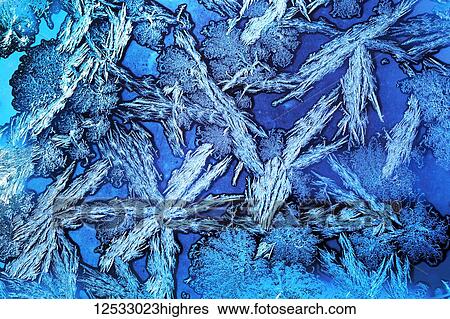 Extreme close-up of frost crystals patterns on glass; Calgary, Alberta, Canada View Large Photo Image Stock Photograph - Extreme close-up of frost crystals patterns on glass; Calgary, Alberta, Canada. Fotosearch
