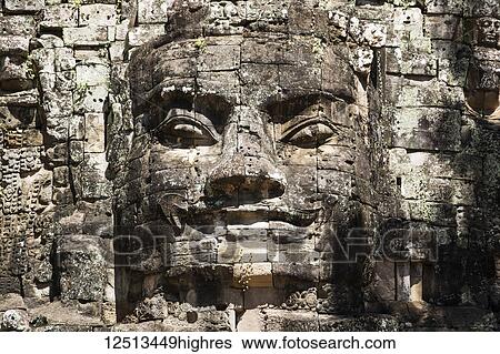 Stock Photograph - Face detail of the Victory Gate tower (Gopuram); Angkor Thom, Siem Reap, Cambodia. Fotosearch