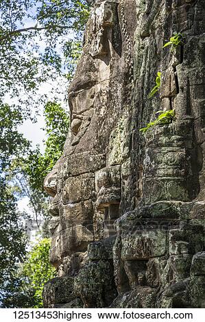 Stock Photograph - Face detail of the Victory Gate tower (Gopuram); Angkor Thom, Siem Reap, Cambodia. Fotosearch