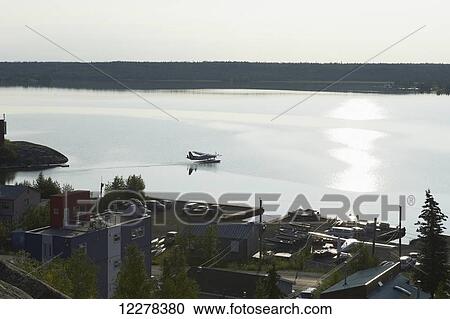 Float plane taxiing for take off; Yellowknife, Northwest Territories, Canada View Large Photo Image Stock Image - Float plane taxiing for take off; Yellowknife, Northwest Territories, Canada. Fotosearch
