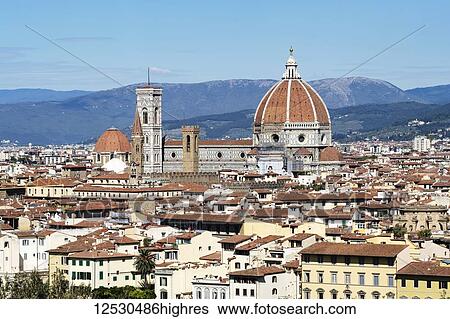 Stock Photograph - Florence cityscape showing Florence Cathedral, Giotto's Campanile and Brunelleschi's Dome; Florence, Tuscany, Italy. Fotosearch