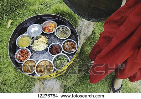 Food carried by a buddhist monk; Bagan, Myanmar View Large Photo Image Picture - Food carried by a buddhist monk; Bagan, Myanmar. Fotosearch