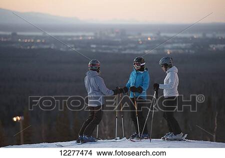 Picture - Friends at the top of Hilltop Ski Area in Anchorage, Alaska. Fotosearch