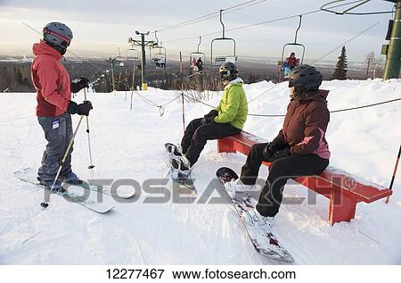 Friends at the top of Hilltop Ski Area in Anchorage, Alaska View Large Photo Image Stock Photo - Friends at the top of Hilltop Ski Area in Anchorage, Alaska . Fotosearch