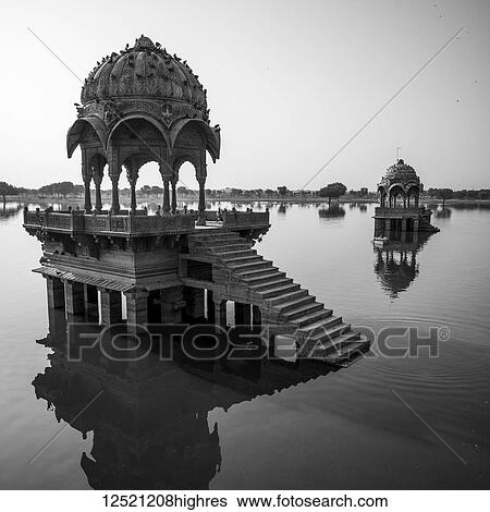 Stock Photograph - Gadsisar Lake, named after Gadsi Singh and is an artificial reservoir that, until 1965, was the only source of water supply to the city; Jaisalmer, Rajasthan, India. Fotosearch