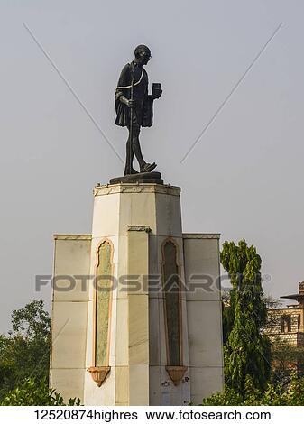 Stock Photograph - Gandhi Circle Garden, a statue of Ghandi; Jaipur, Rajasthan, India. Fotosearch