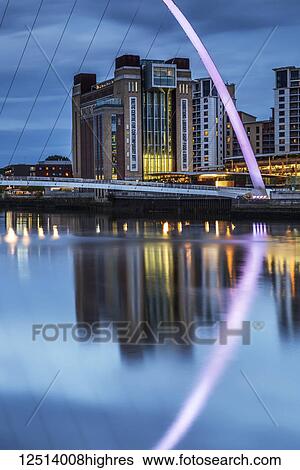 Gateshead Millennium Bridge and BALTIC Centre for Contemporary Art reflected in the River Tyne; Gateshead, Tyne and Wear, England View Large Photo Image Stock Photograph - Gateshead Millennium Bridge and BALTIC Centre for Contemporary Art reflected in the River Tyne; Gateshead, Tyne and Wear, England. Fotosearch