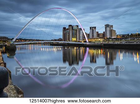 Gateshead Millennium Bridge and reflection in the River Tyne; Gateshead, Tyne and Wear, England View Large Photo Image Stock Photograph - Gateshead Millennium Bridge and reflection in the River Tyne; Gateshead, Tyne and Wear, England. Fotosearch