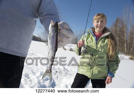 Girl ice fishing on Matanuska Lake in the Matanuska Valley north of Anchorage, Southcentral Alaska View Large Photo Image Stock Image - Girl ice fishing on Matanuska Lake in the Matanuska Valley north of Anchorage, Southcentral Alaska. Fotosearch