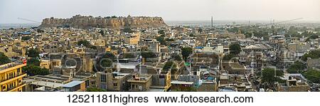 Stock Photograph - Golden Jaisalmer Fort, the only living fort in the world; Jaisalmer, Rajasthan, India. Fotosearch