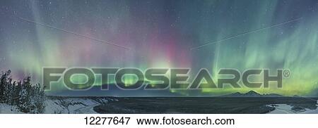 Green and red northern lights over the Copper River and Wrangell Mountains near Glennallen, Southcentral Alaska, USA, Winter View Large Photo Image Stock Photo - Green and red northern lights over the Copper River and Wrangell Mountains near Glennallen, Southcentral Alaska, USA, Winter. Fotosearch