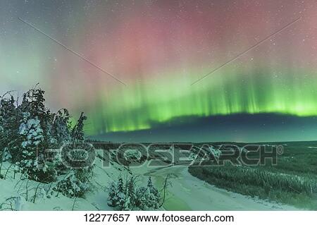 Green and red northern lights over the Copper River near Glennallen, Southcentral Alaska, USA, Winter View Large Photo Image Stock Photo - Green and red northern lights over the Copper River near Glennallen, Southcentral Alaska, USA, Winter. Fotosearch