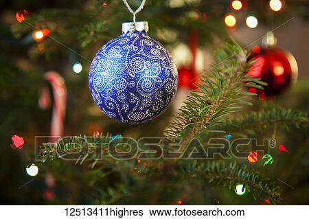 Hand-painted blue Christmas bauble on a Christmas tree; Waco, Texas, United States of America View Large Photo Image Stock Photograph - Hand-painted blue Christmas bauble on a Christmas tree; Waco, Texas, United States of America. Fotosearch