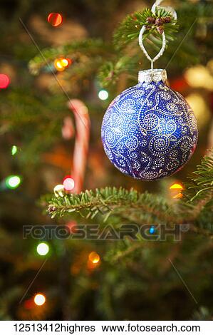 Hand-painted blue Christmas bauble on a Christmas tree; Waco, Texas, United States of America View Large Photo Image Stock Photograph - Hand-painted blue Christmas bauble on a Christmas tree; Waco, Texas, United States of America. Fotosearch