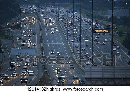 Highway 401 looking West towards Yonge Street at dusk; Toronto, Ontario, Canada View Large Photo Image Stock Photograph - Highway 401 looking West towards Yonge Street at dusk; Toronto, Ontario, Canada. Fotosearch