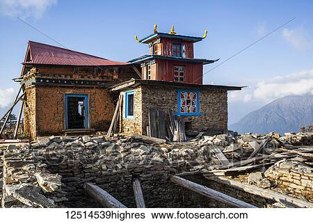 Stock Photograph - Himalayan temple with earthquake damage; Nepal. Fotosearch