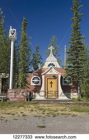 Stock Image - Historic Catholic Church along the Alaska Highway at Beaver Creek, Northern Yukon Territory, Canada, Summer. Fotosearch