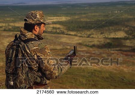 Hunter Reading Gps Alaska Peninsula Southwest Ak Fall Portrait View Large Photo Image Stock Image - Hunter Reading Gps Alaska Peninsula Southwest Ak Fall Portrait. Fotosearch