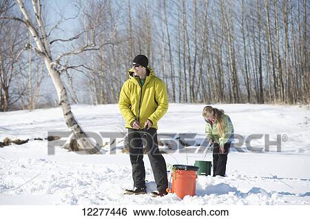Ice fishing with guides on Matanuska Lake in the Matanuska Valley north of Anchorage, Alaska, winter View Large Photo Image Stock Photograph - Ice fishing with guides on Matanuska Lake in the Matanuska Valley north of Anchorage, Alaska, winter. Fotosearch