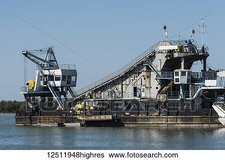 Industrial barge on the Danube River; Kostolac, Vojvodina, Serbia View Large Photo Image Stock Photograph - Industrial barge on the Danube River; Kostolac, Vojvodina, Serbia. Fotosearch