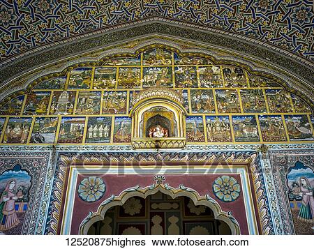 Stock Photograph - Interior decor with ornately designed walls in Samode Haveli Hotel; Jaipur, Rajasthan, India. Fotosearch