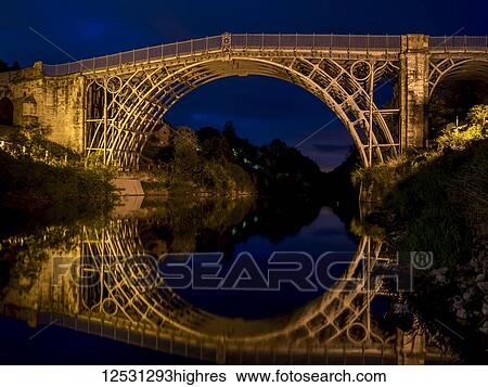 Iron bridge illuminated at dusk; Shropshire, England View Large Photo Image Stock Photograph - Iron bridge illuminated at dusk; Shropshire, England. Fotosearch