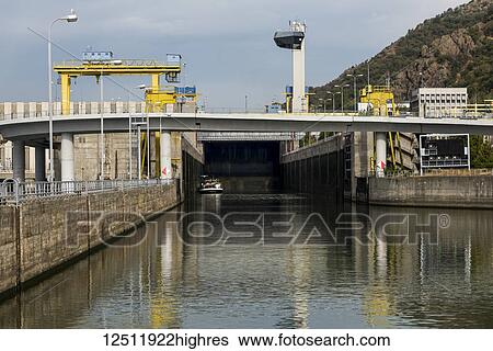 Iron Gate, Hydroelectric Power Station, the largest dam on the Danube River and one of the largest hydro power plants in Europe; Drobeta-Turnu Severin, Jude? ul Mehedin? i, Serbia View Large Photo Image Stock Photograph - Iron Gate, Hydroelectric Power Station, the largest dam on the Danube River and one of the largest hydro power plants in Europe; Drobeta-Turnu Severin, Jude? ul Mehedin? i, Serbia. Fotosearch
