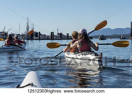 Kayaking in Clayoquot Sound, Vancouver Island; Tofino, British Columbia, Canada View Large Photo Image Stock Photograph - Kayaking in Clayoquot Sound, Vancouver Island; Tofino, British Columbia, Canada. Fotosearch