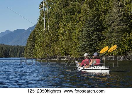 Kayaking in Clayoquot Sound, Vancouver Island; Tofino, British Columbia, Canada View Large Photo Image Stock Photograph - Kayaking in Clayoquot Sound, Vancouver Island; Tofino, British Columbia, Canada. Fotosearch