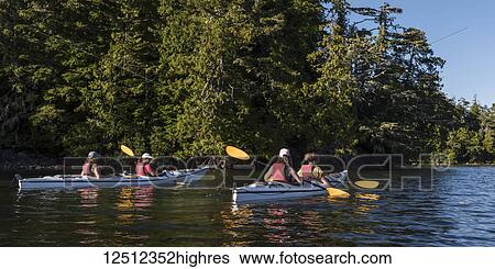 Stock Photograph - Kayaking in Clayoquot Sound, Vancouver Island; Tofino, British Columbia, Canada. Fotosearch