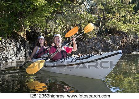 Stock Photograph - Kayaking in Clayoquot Sound, Vancouver Island; Tofino, British Columbia, Canada. Fotosearch