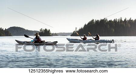 Stock Photograph - Kayaking in Clayoquot Sound, Vancouver Island; Tofino, British Columbia, Canada. Fotosearch