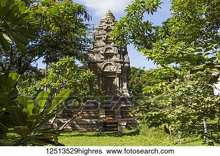 Stock Photograph - Khmer style pagoda at Wat Damnak; Siem Reap, Cambodia. Fotosearch