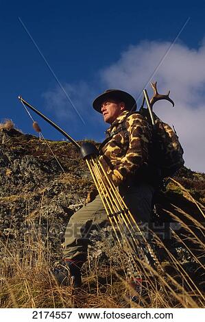 Kodiak Bowhunter Deer Hunt Longbow Blacktail Antlers Ak Southwest Fall Scenic Sky Man View Large Photo Image Stock Photo - Kodiak Bowhunter Deer Hunt Longbow Blacktail Antlers Ak Southwest Fall Scenic Sky Man. Fotosearch