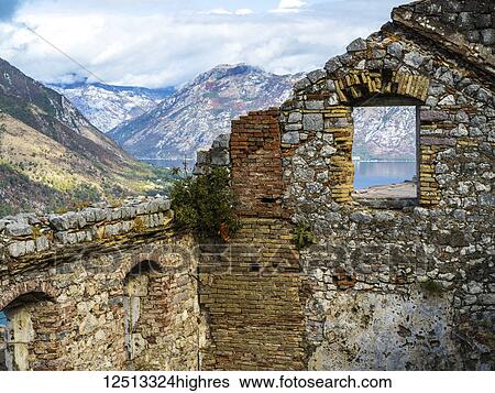 Kotor's Castle of San Giovanni among the rugged mountains and the Gulf of Kotor; Kotor, Monte View Large Photo Image Stock Photograph - Kotor's Castle of San Giovanni among the rugged mountains and the Gulf of Kotor; Kotor, Monte. Fotosearch