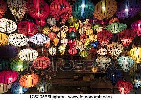 Stock Photograph - Lanterns for sale in the Old Town at night; Hoi An, Quang Nam, Vietnam. Fotosearch