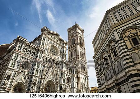 Large decorative cathedral with tower and blue sky and clouds; Florence, Tuscany, Italy View Large Photo Image Stock Photograph - Large decorative cathedral with tower and blue sky and clouds; Florence, Tuscany, Italy. Fotosearch