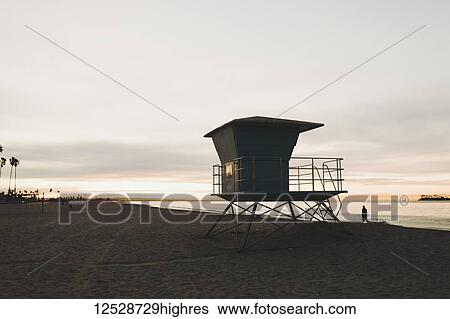 Stock Photograph - Lifeguard station at sunrise, Long Beach; California, United States of America. Fotosearch