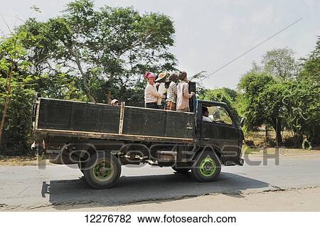 Local workers riding in the back of the truck; Bagan, Myanmar View Large Photo Image Stock Image - Local workers riding in the back of the truck; Bagan, Myanmar. Fotosearch