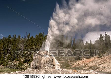 Stock Photograph - Lone Star Geyser is a cone type geyser located in the Lone Star Geyser Basin of Yellowstone National Park; Wyoming, United States of America. Fotosearch
