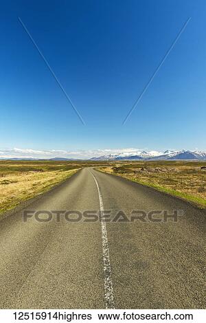 Stock Photograph - Looking along road from the Snaefellsnes peninsula to Borgarnes; Iceland. Fotosearch