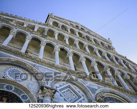 Low angle view of the classical marble facade of St. Mary's cathederal; Pisa, Italy View Large Photo Image Stock Photograph - Low angle view of the classical marble facade of St. Mary's cathederal; Pisa, Italy. Fotosearch