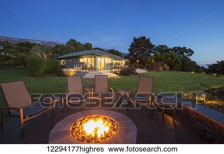 Luxury Backyard Fire Pit At Sunset View Large Photo Image Stock Photograph - Luxury Backyard Fire Pit At Sunset. Fotosearch