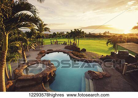 Luxury Home With Swimming Pool At Sunset View Large Photo Image Stock Photograph - Luxury Home With Swimming Pool At Sunset. Fotosearch