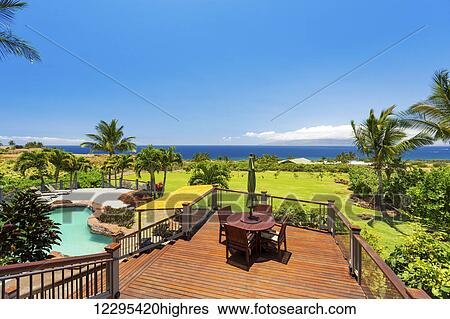 Stock Photograph - Luxury Home With Swimming Pool. Fotosearch