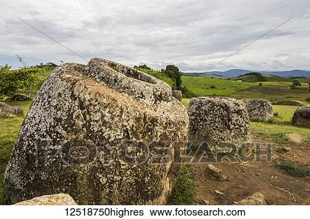 Stock Photograph - Megalithic stone jars at Site 1, Plain of Jars; Xiangkhouang, Laos. Fotosearch