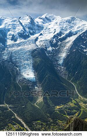 Mont Blanc Massif above Chamonix town, viewed from Aiguilles Rouges; Chamonix-Mont-Blanc, Haute-Savoie, France View Large Photo Image Stock Photograph - Mont Blanc Massif above Chamonix town, viewed from Aiguilles Rouges; Chamonix-Mont-Blanc, Haute-Savoie, France. Fotosearch