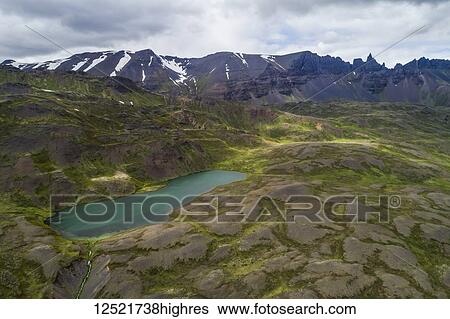 Stock Photograph - Mountain lake in rural Northern Iceland; Iceland. Fotosearch