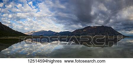 Mountains in the St. Elias range reflected in a tranquil lake, Kluane National Park and Reserve; Destruction Bay, Yukon, Canada View Large Photo Image Stock Photograph - Mountains in the St. Elias range reflected in a tranquil lake, Kluane National Park and Reserve; Destruction Bay, Yukon, Canada. Fotosearch